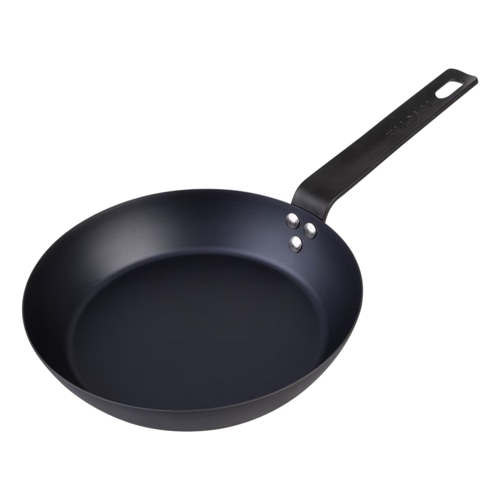Black frying pan on a white background