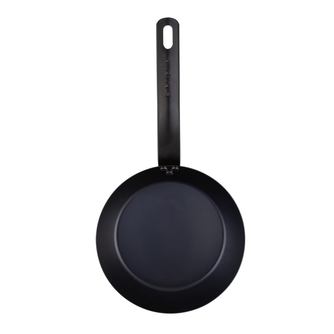 Black frying pan with a handle on a white background