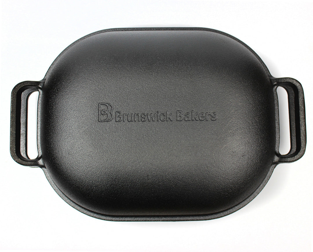 Black cast iron bread pan with &