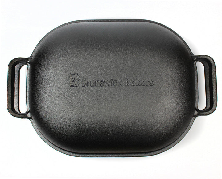 Black cast iron bread pan with &
