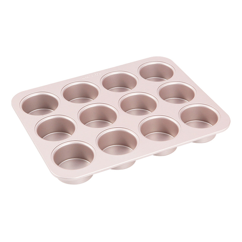 Muffin pan on a white background