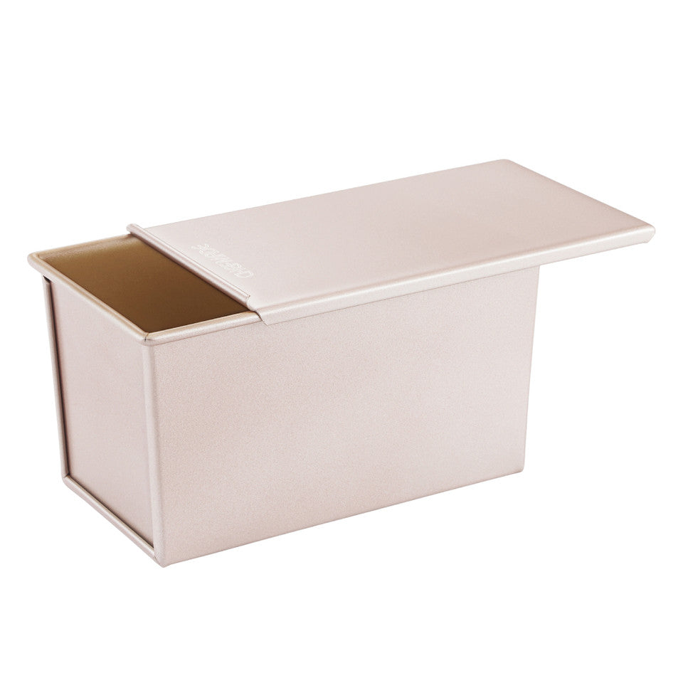 Rectangular bread tin with a lid on a white background