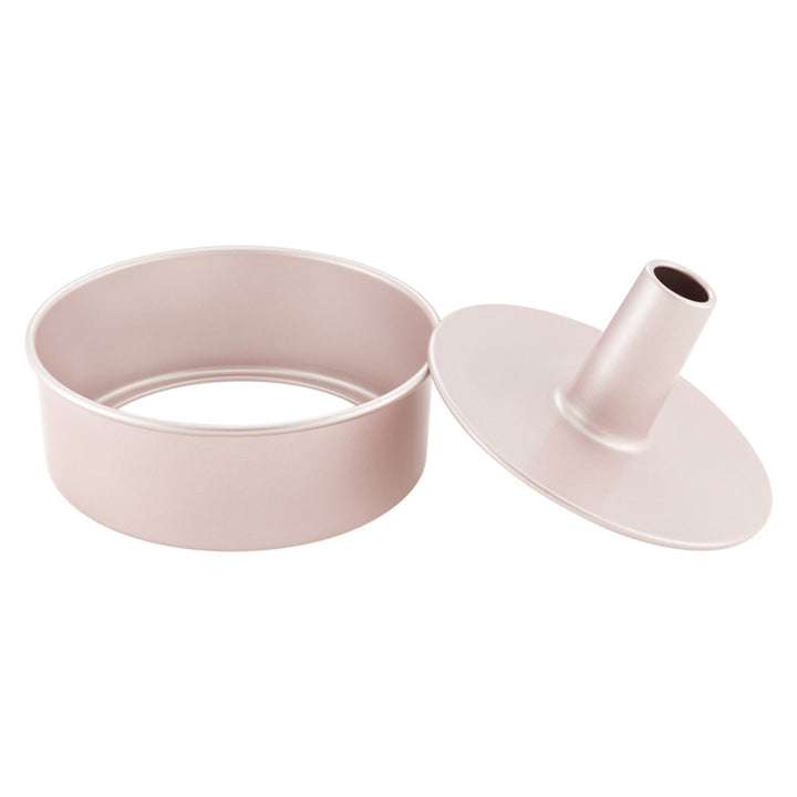 A pink angel cake pan on a white background