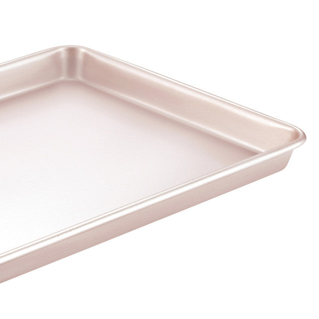 Metal baking tray on a white background