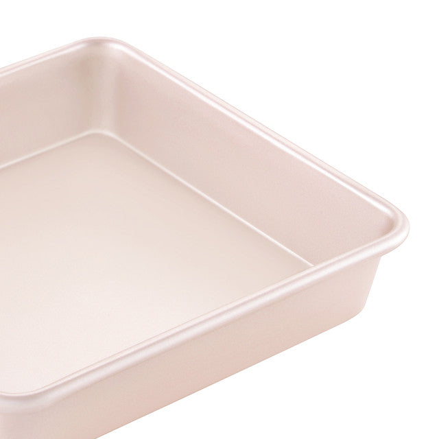 Pink baking tin on a white background