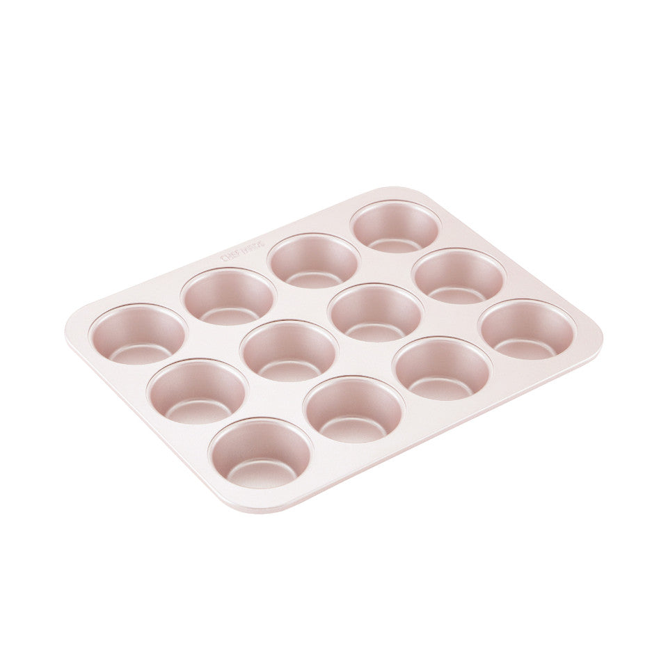 Pink chefmade muffin pan on a white background