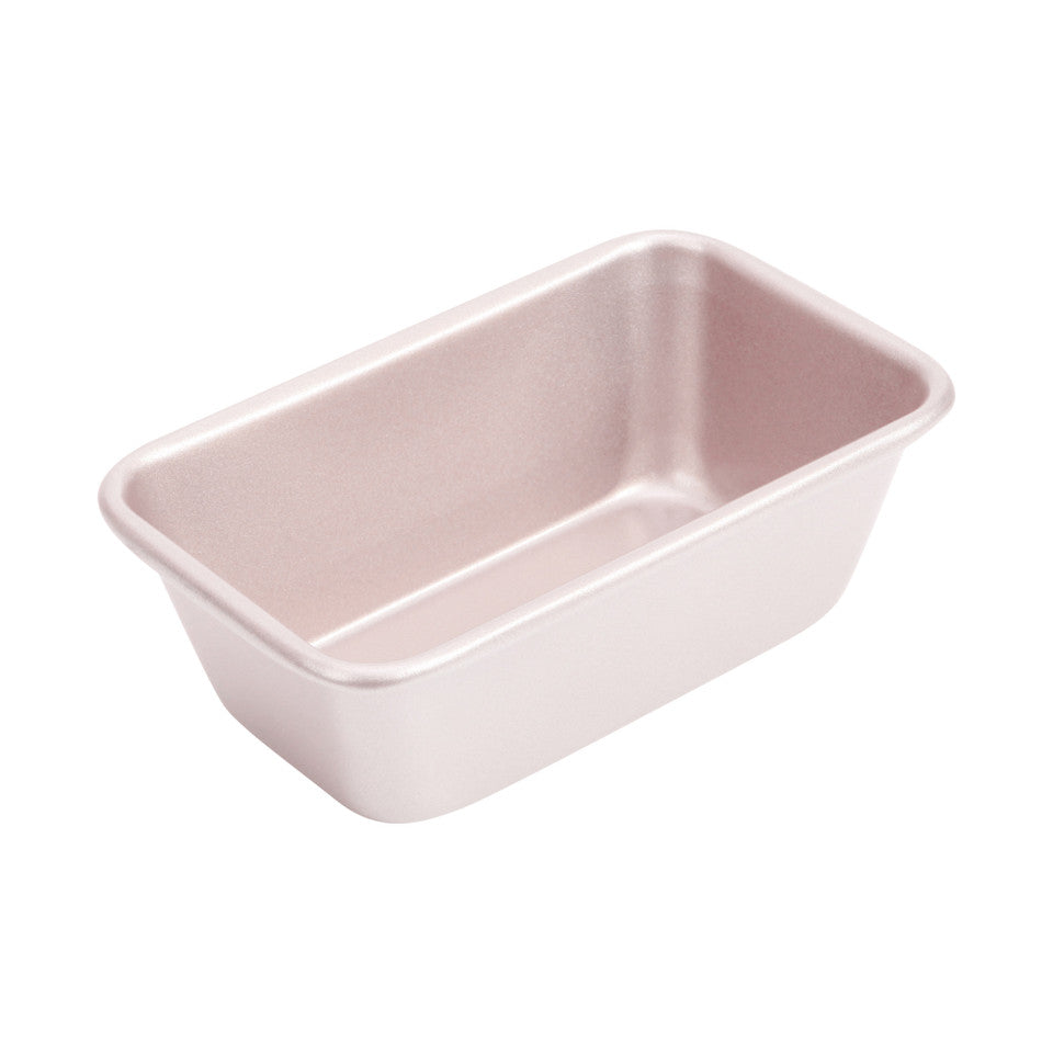 Small pink loaf tin on a white background