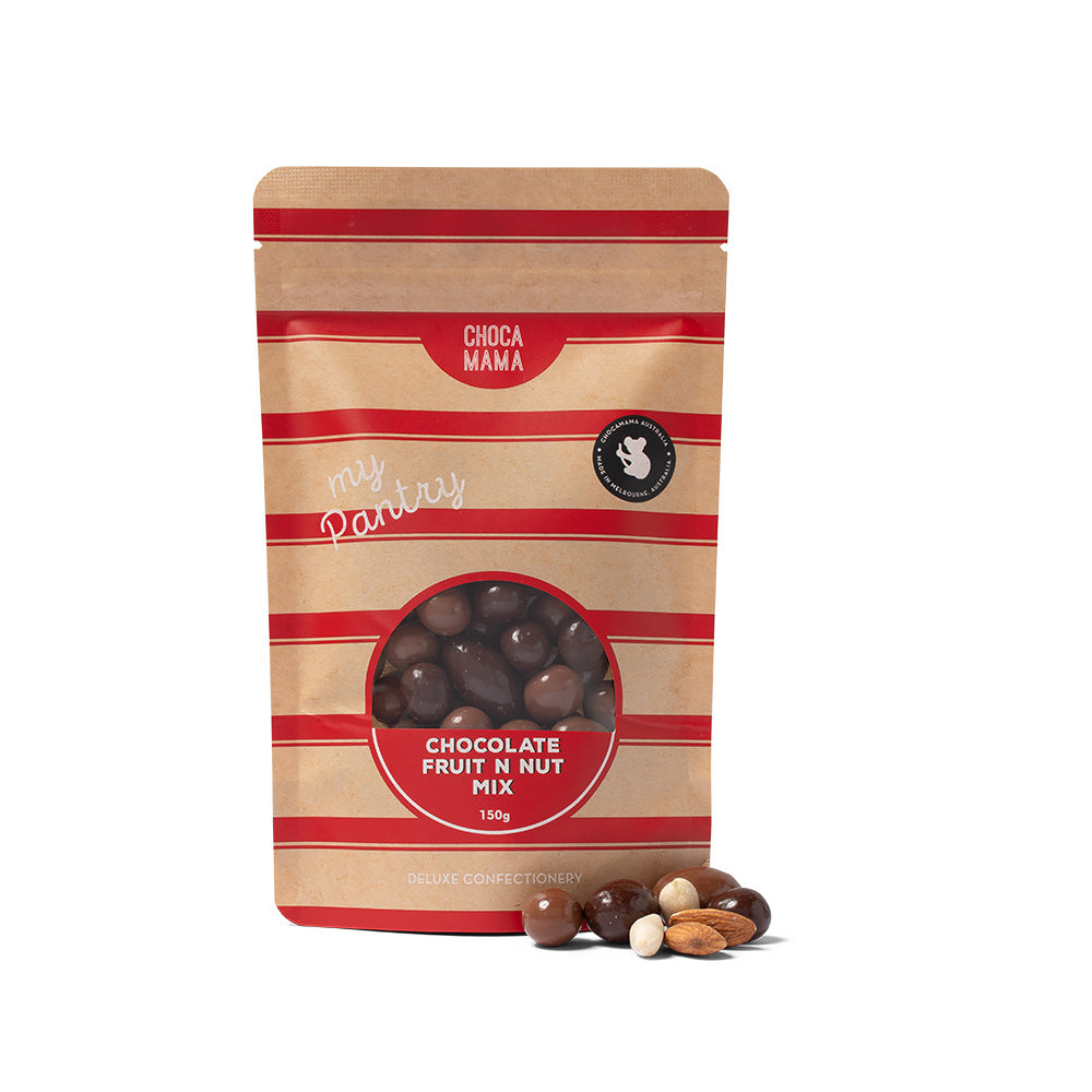 A stand-up pouch of Choco Mama Chocolate Fruit N Nut Mix on a white background, with a few nuts placed in front of the package.