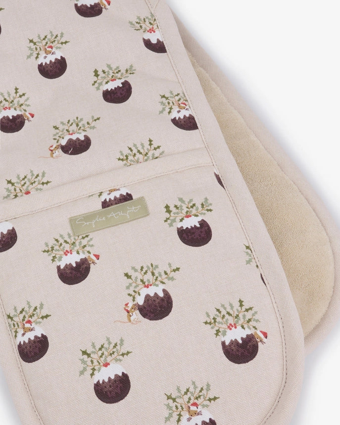A cream-colored oven mitt with a repeated Christmas pudding pattern, on a white background