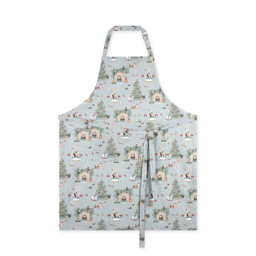 Apron with a detailed holiday fireplace illustration pattern on a white background