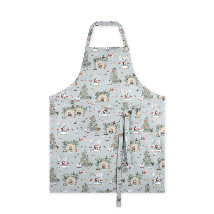Apron with a detailed holiday fireplace illustration pattern on a white background