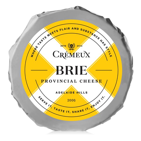 A wheel of brie cheese in a white background