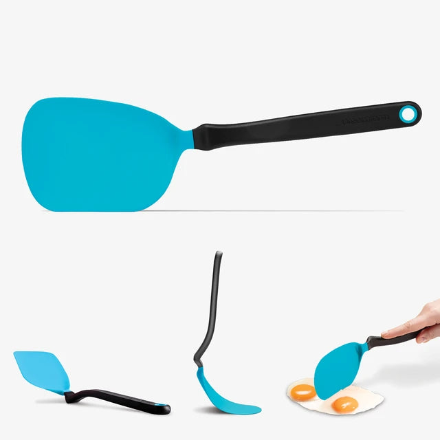 Blue spatula with black handle on a white background
