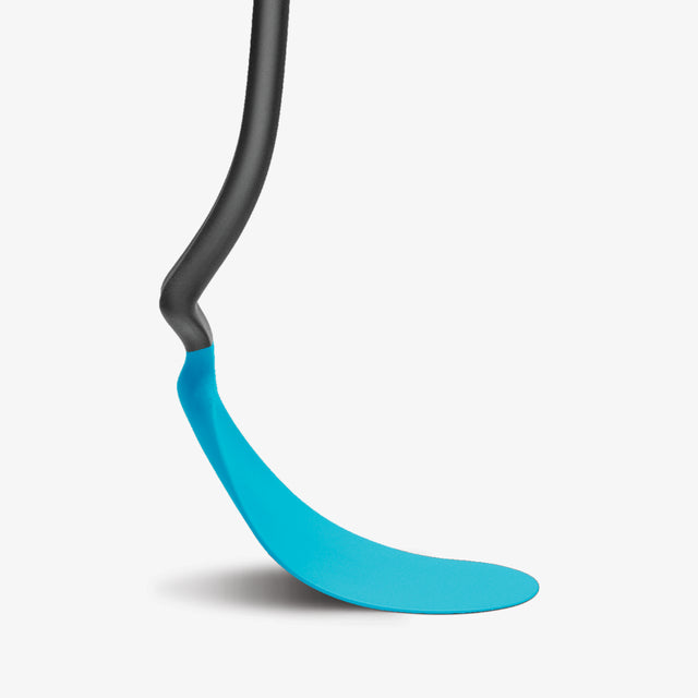 Blue spatula with black handle on a white background