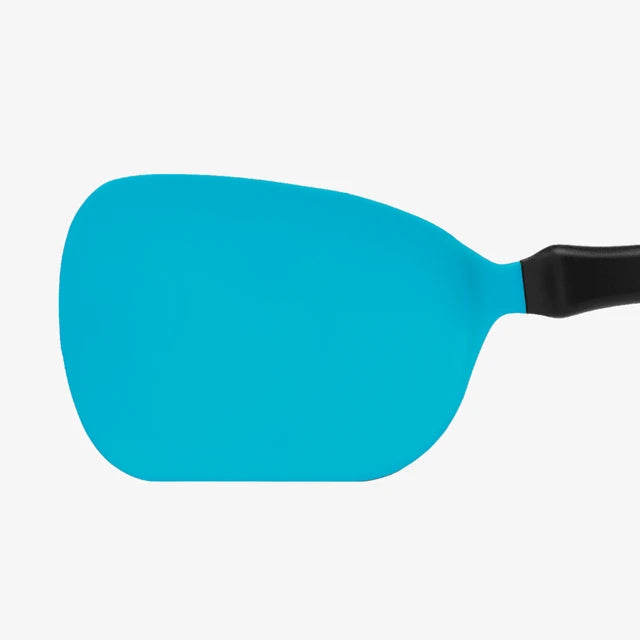 Blue spatula with black handle on a white background