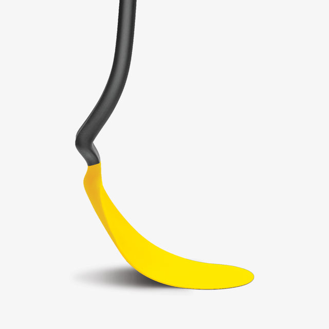 Yellow and black spatula on a white background