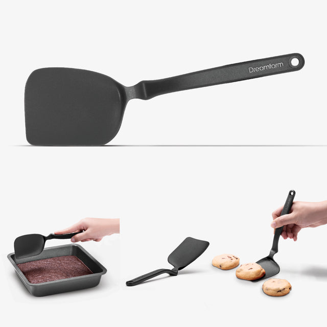 Black spatula with 'Dreamfarm' branding used for baking and serving cookies.