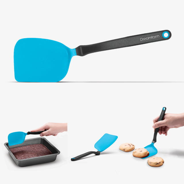 Blue spatula with black handle on a white background, used for baking and serving.