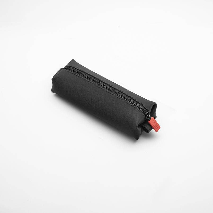 Black zipper toiletry pouch with a red pull tab on a white background