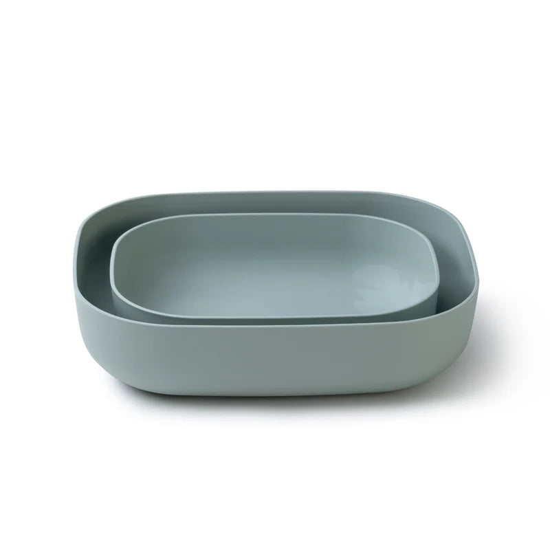 A set of two nested rectangular containers with rounded corners in a muted sage green color, photographed on a clean white background.