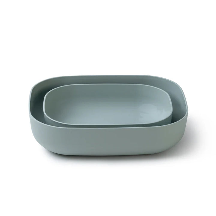 A set of two nested rectangular containers with rounded corners in a muted sage green color, photographed on a clean white background.