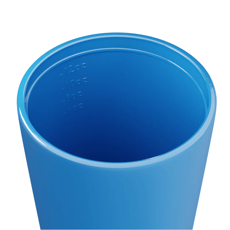 Inside of a blue travel mug on a white background