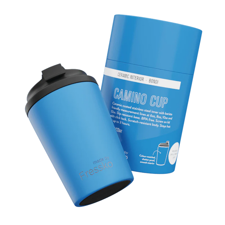 Blue ceramic travel mug with black lid and &