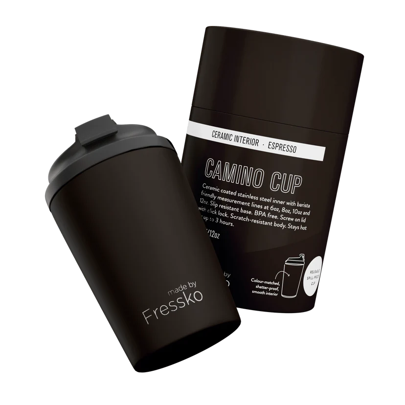 Brown travel mug with packaging on a white background