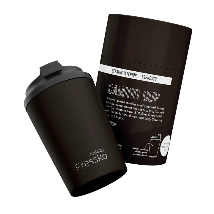 Brown travel mug with packaging on a white background