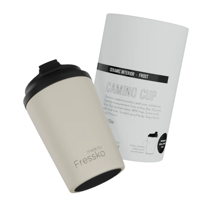 Beige travel mug with black lid and &