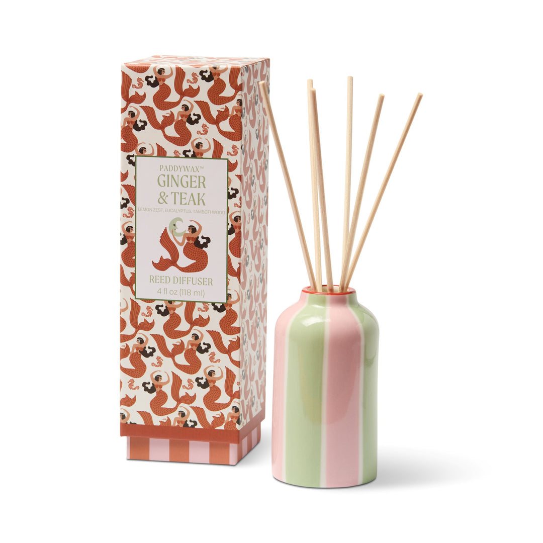 Ginger &amp; Teak reed diffuser with packaging on a white background