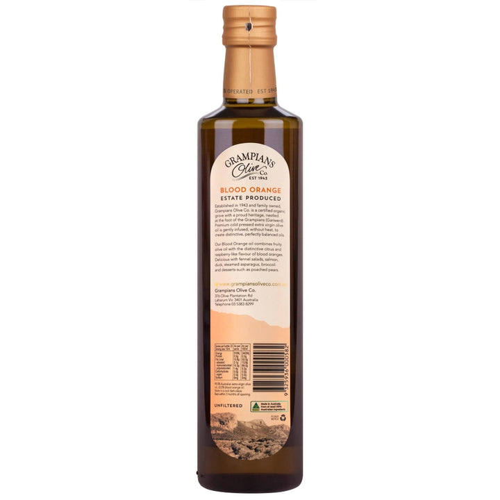 Bottle of blood orange olive oil with a label on a white background