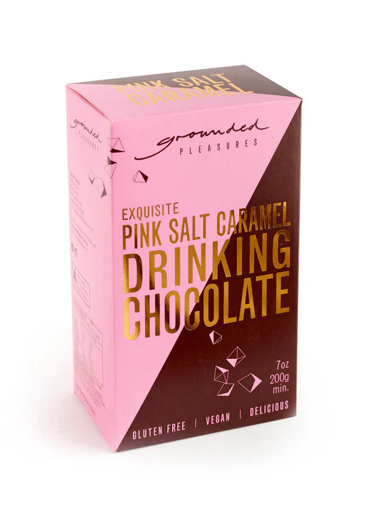 Pink and brown packaging of Exquisite Pink Salt Caramel Drinking Chocolate with 'grounded Pleasures' branding.