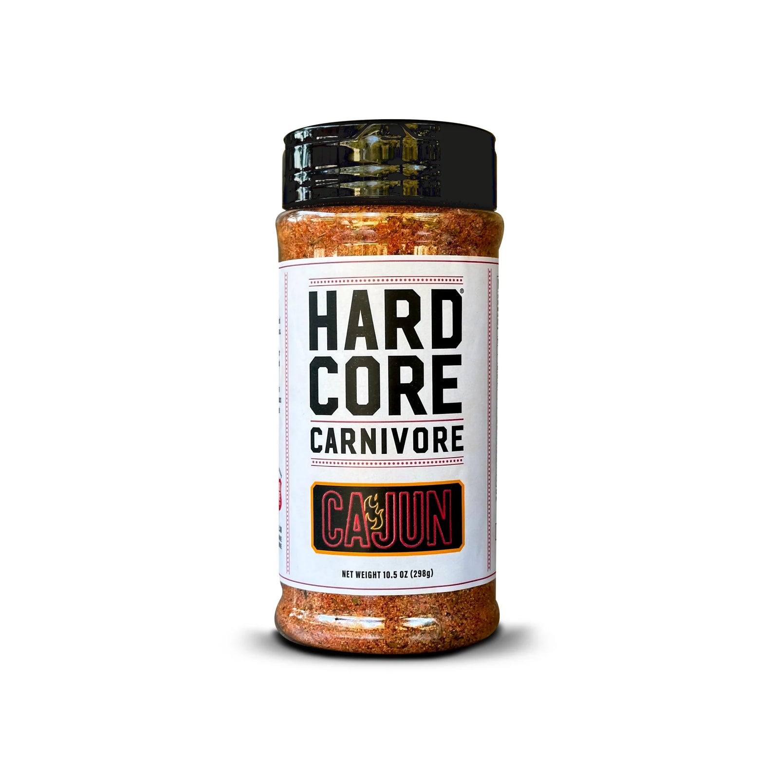 A bottle of Hardcore Carnivore Cajun seasoning with a label displaying the brand name and the word 'Carnivore' in a stylized font, against a transparent background.