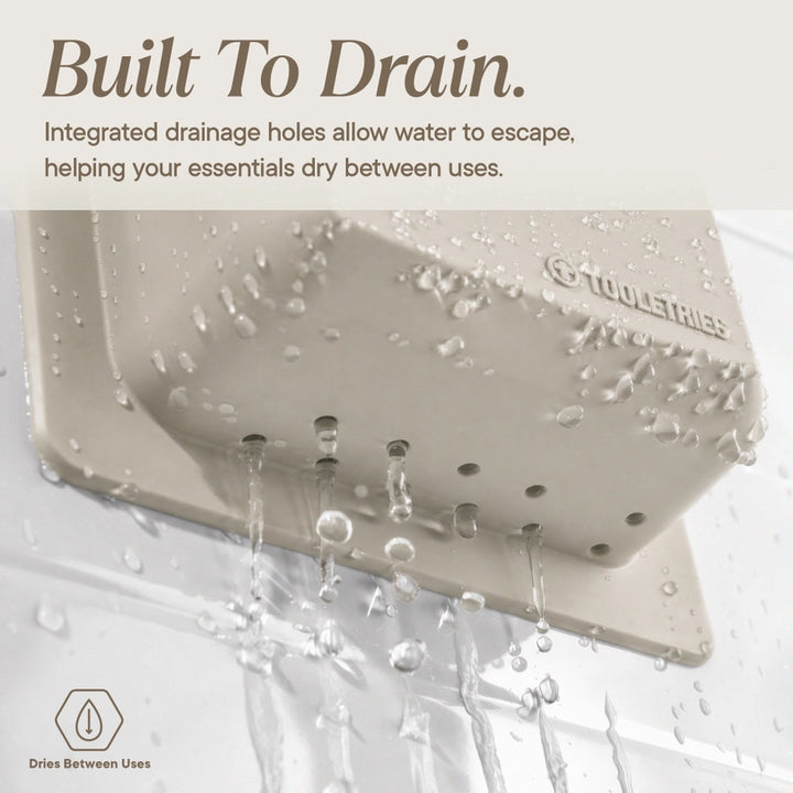 Bottom view of a sand coloured silicone toiletry holder with drain holes