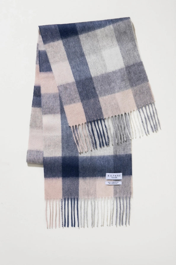 Plaid scarf with fringes on a white background