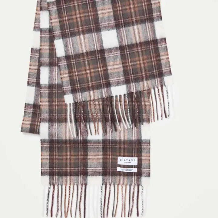 Plaid scarf with fringes on a white background