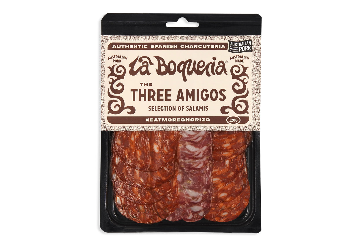 Packaged selection of salamis with 'La Boquería' label on a white background