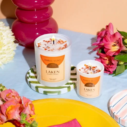 Two candles labeled &