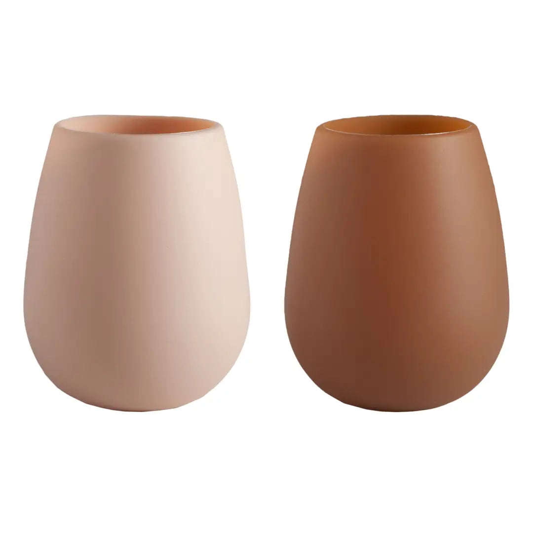 Two silicone cups in light beige and medium terracotta brown, shown side-by-side on a plain white background.