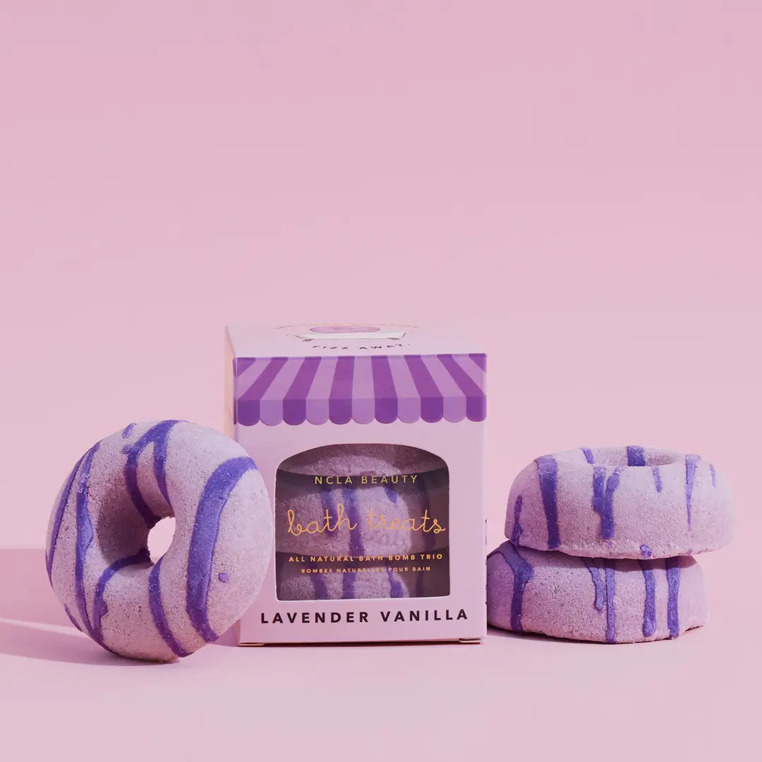 Bath bombs with lavender vanilla scent on a pink background
