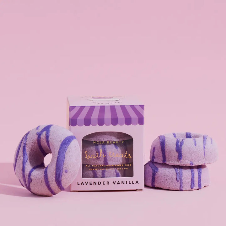 Bath bombs with lavender vanilla scent on a pink background