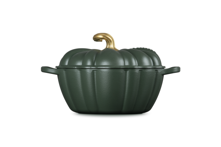 A dark green pumpkin-shaped cast iron Dutch oven with a matching lid and a gold-colored faux-stem handle, shown on a solid white background.
