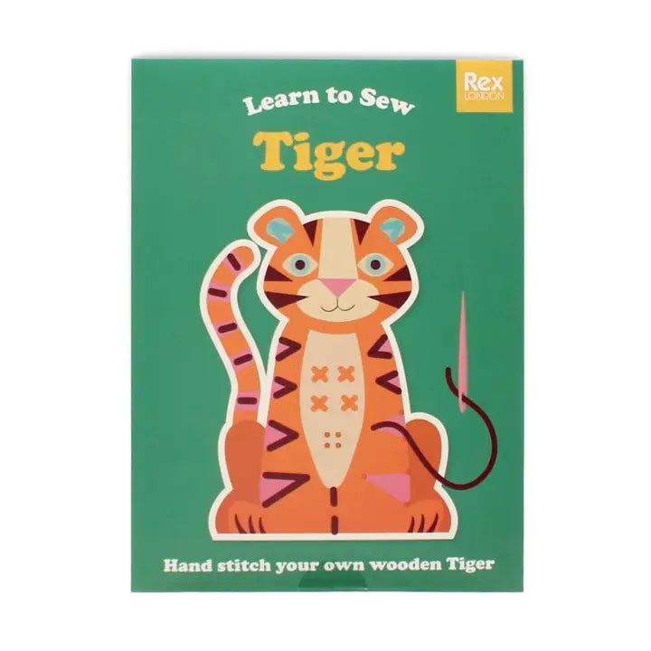 learn to sew tiger packaging on a white background