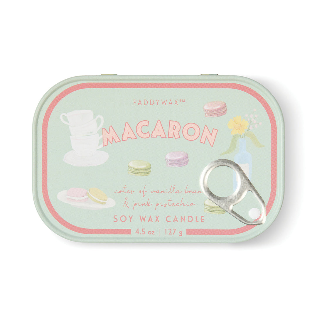 Paddywax Macaron soy wax candle tin with colorful macaron illustrations on a white background