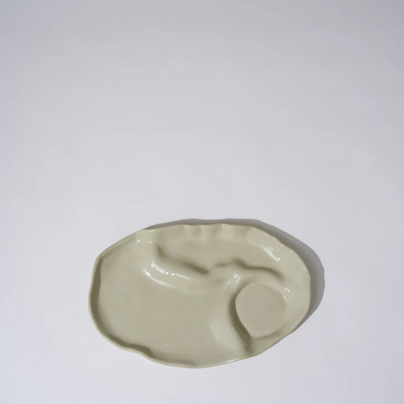 Small ceramic dish on a white background