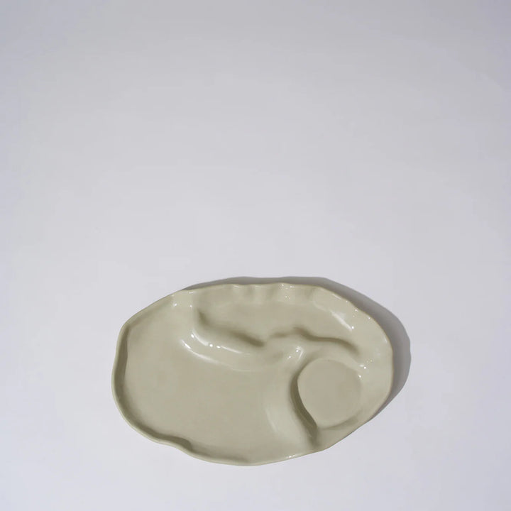Small ceramic dish on a white background
