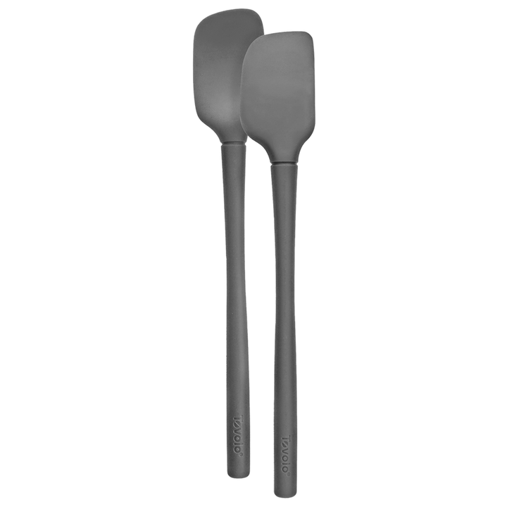 Two gray silicone spatulas on a white background