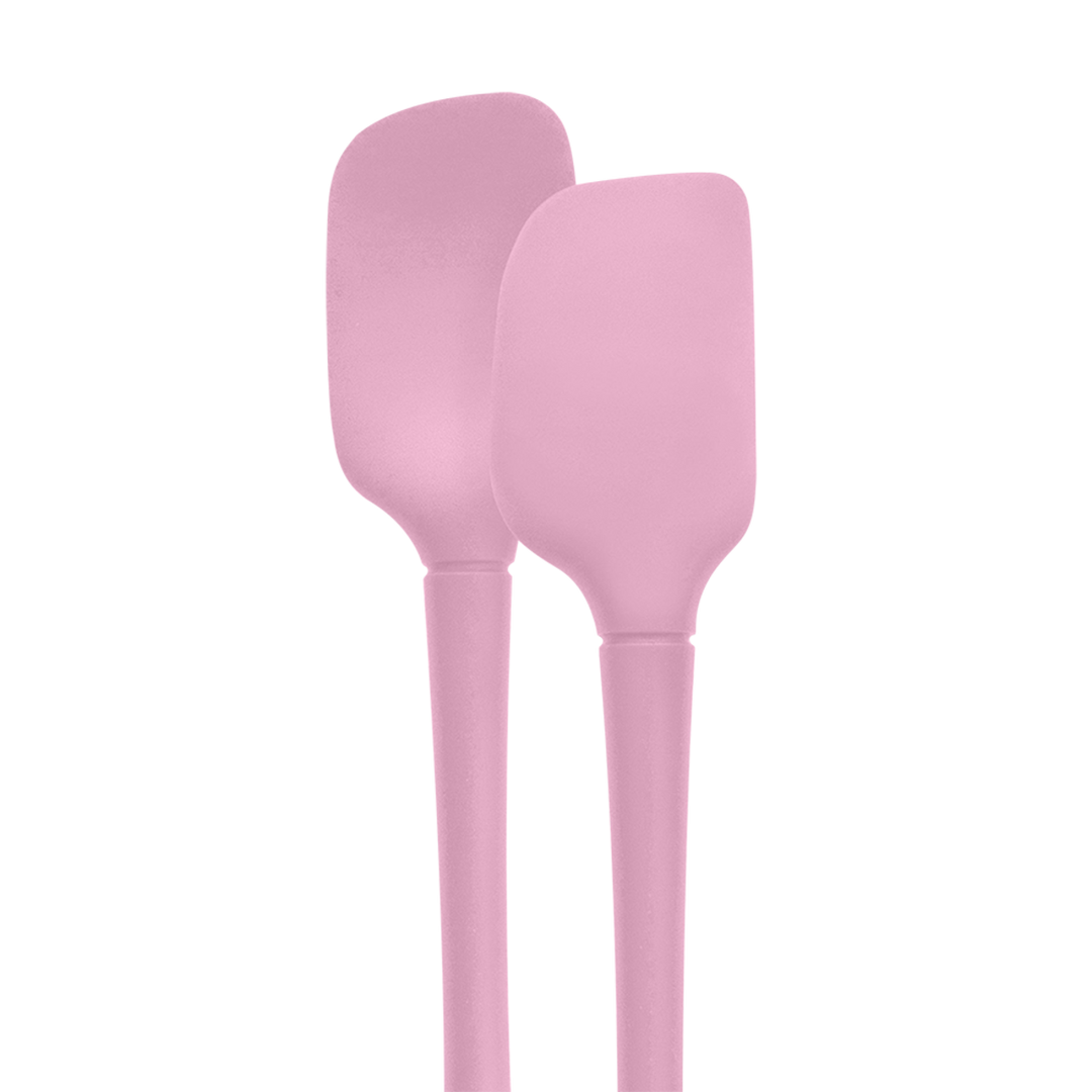 Two pink silicone spatulas on a white background