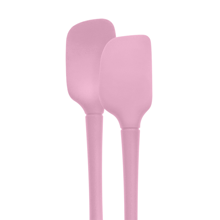 Two pink silicone spatulas on a white background